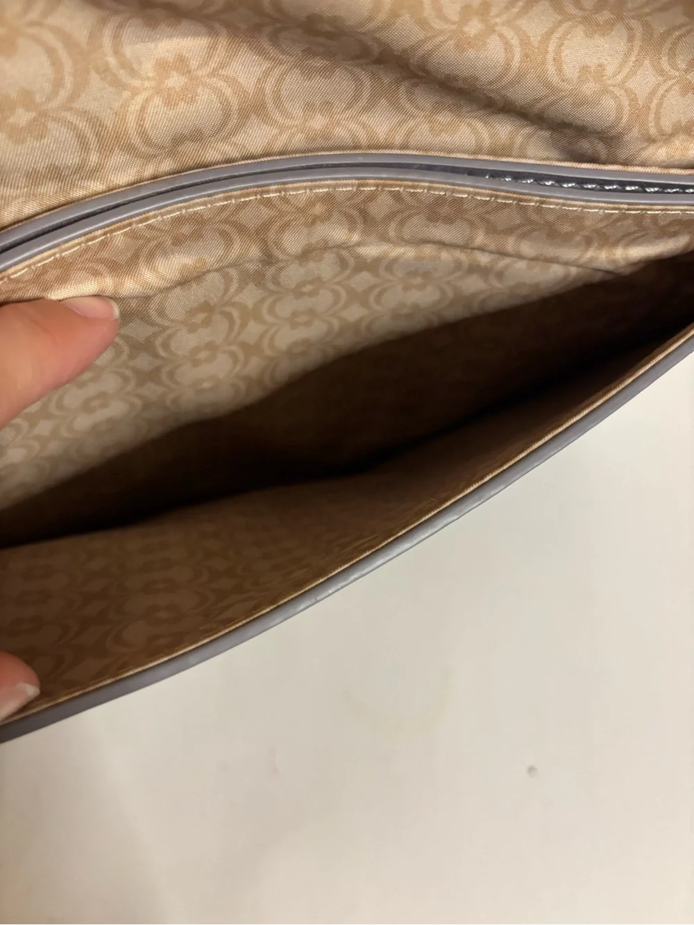 Stud-Trim Gray Wristlet Clutch